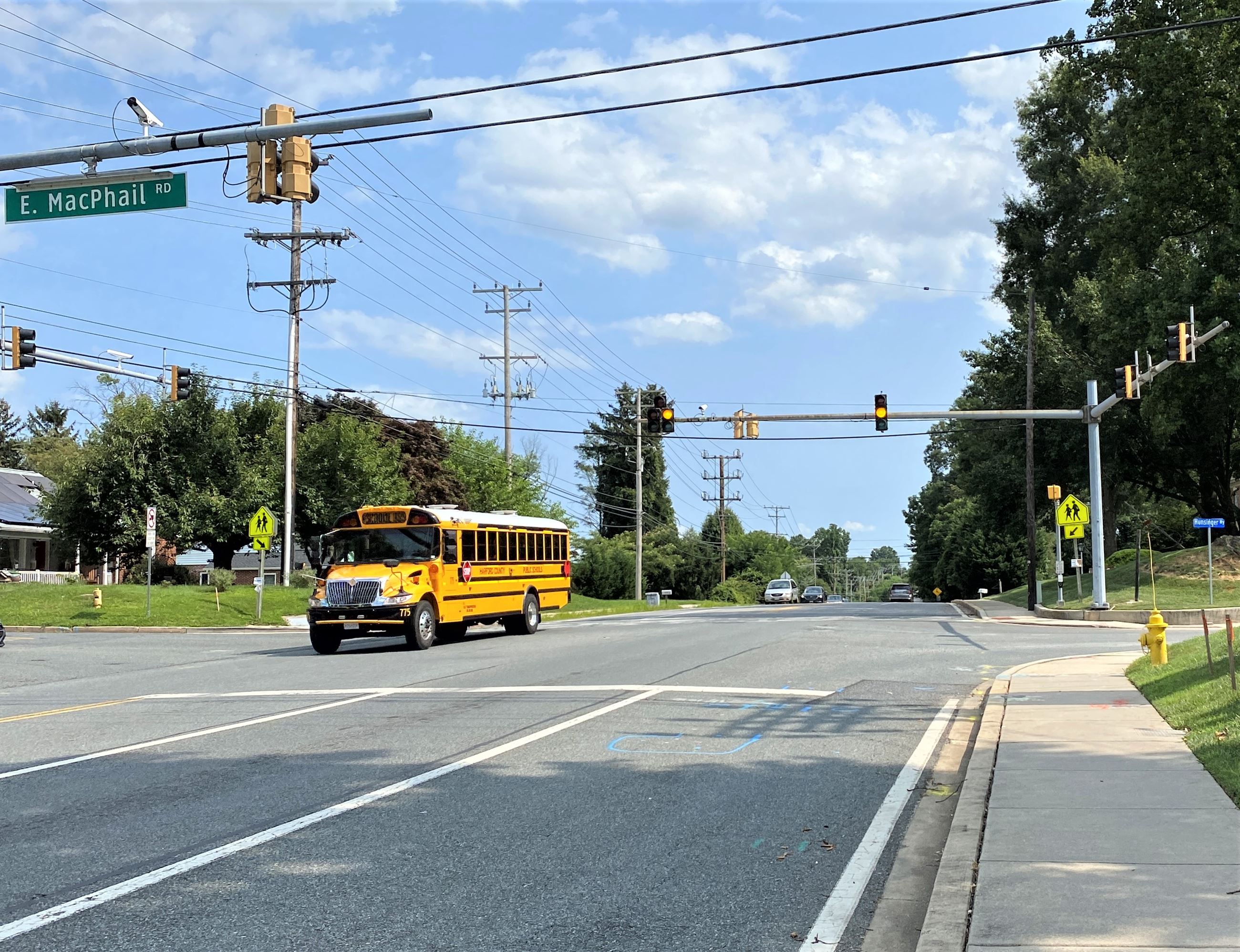 A photo of a school bus passing through the intersection of Route 924 and MacPhail Road in Bel Air