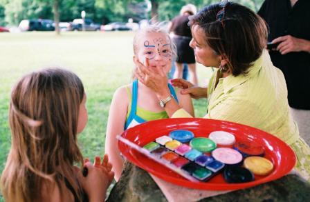 Facepainting at outdoor movie